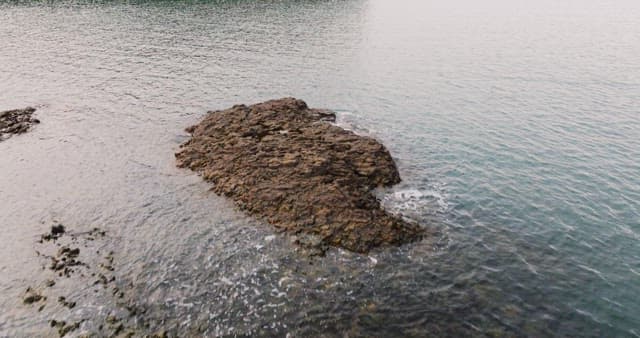 Serene Coastal Landscape with Cliff and Sea