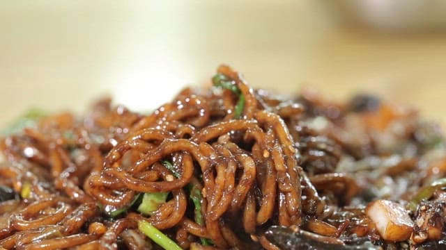 Seafood Jjajangmyeon served with leaf mustard kimchi