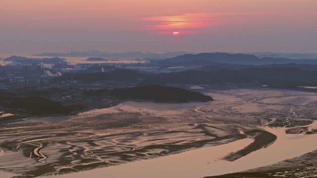 Sunset over an distant mountains