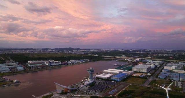 Cityscape with a river at sunset