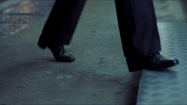 Person with Shoe Walking on the Sidewalk