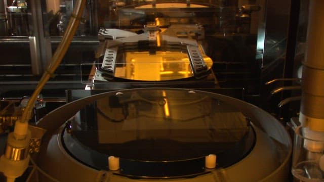 Automated machinery in a semiconductor manufacturing plant