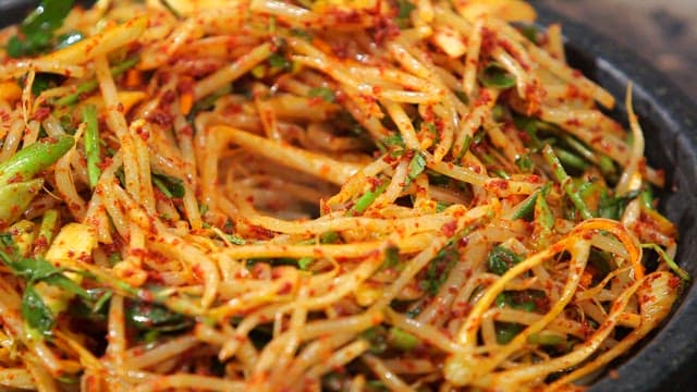 Spicy seasoned octopus on top of bean sprouts