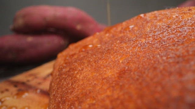 Sweet potato soufflé pancakes with syrup and sugar powder