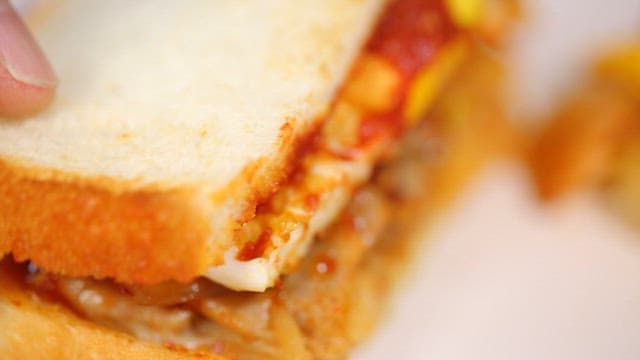 Korean sandwich with egg, sauce and pork bulgogi