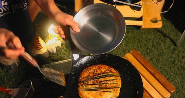 Preparing Savory Korean pancake on a Hot Skillet