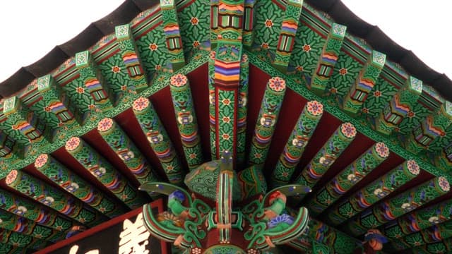 Intricate patterns on a traditional Korean roof