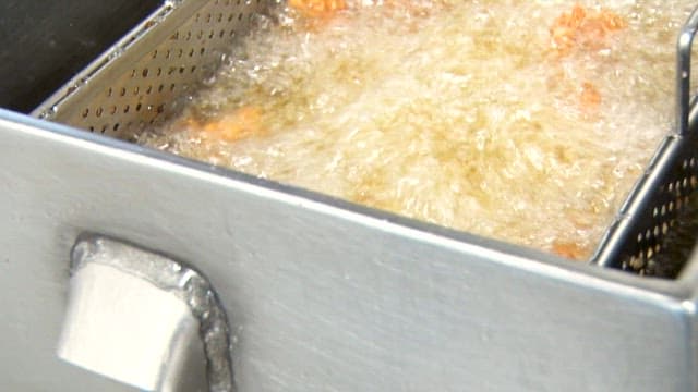Chicken fried in hot, boiling oil to a golden brown color