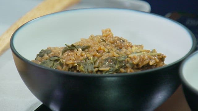 Delicious fried rice with steaming spinach
