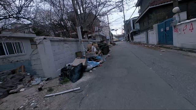 Desolate Urban Street with Scattered Debris