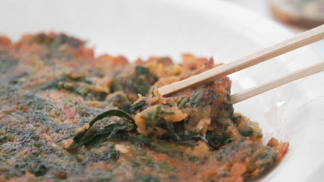 Chopsticks of Delicious Fried Korean Thistle Pancakes