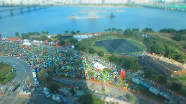 Aerial View of Outdoor Festival by the River