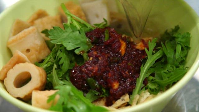 Fish cake soup with spicy sauce