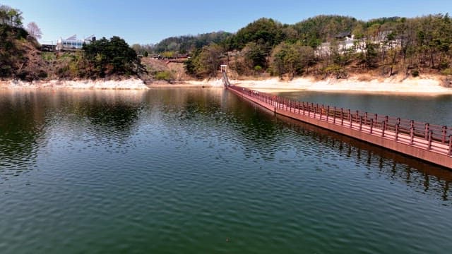 Peaceful lake with a wooden walkway