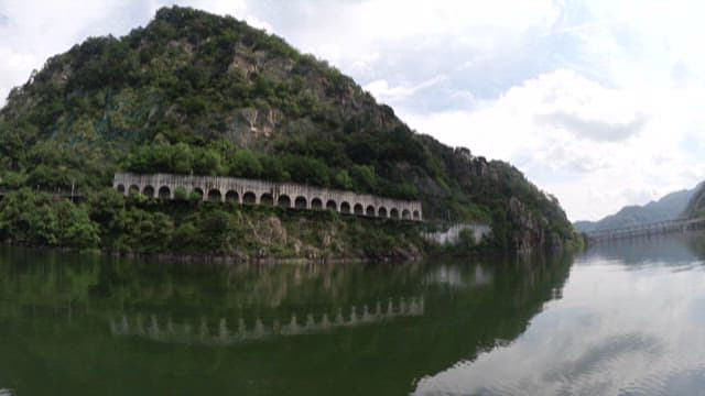 Serene Lake and Hills Seen from Boat