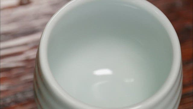 Pouring golgamju into a white ceramic cup