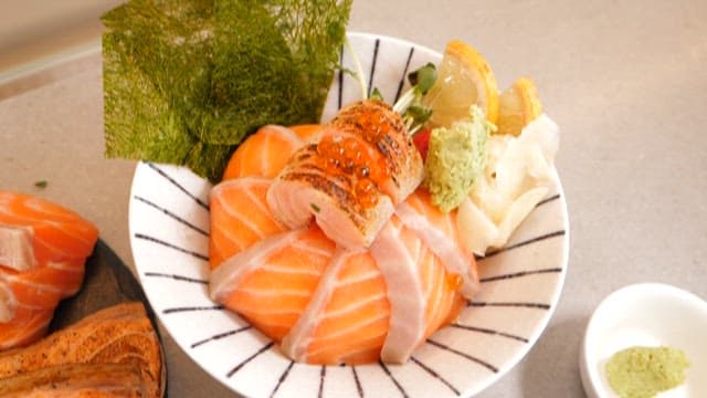 Delicious salmon rice bowl cooked with fresh ingredients