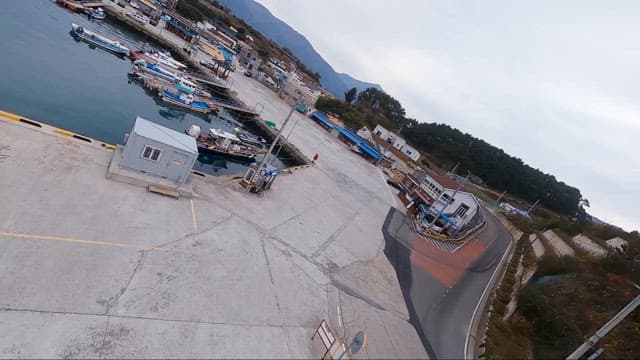 Moored Fishing Boats at a Coastal Village Dock