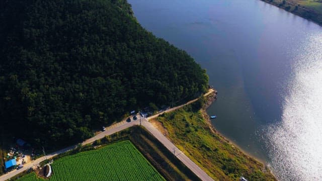 View of mountain surroundings with river and agricultural fields