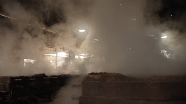 Inside a factory full of smoke