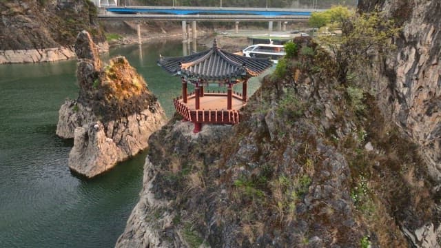 Traditional pavilion on a rocky cliff