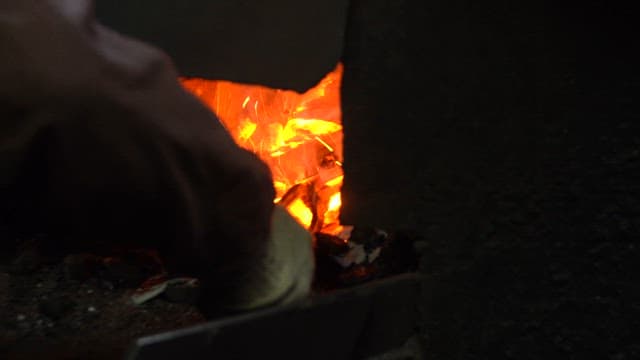 Metal being heated in a furnace