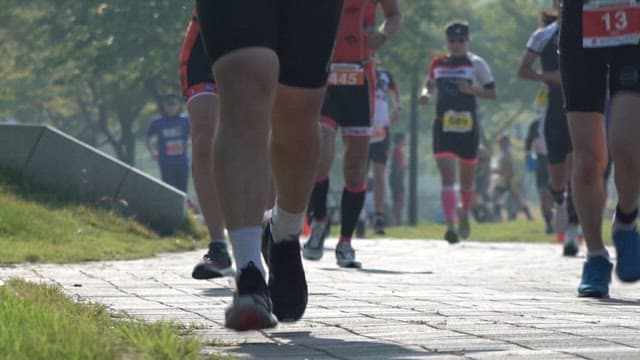 Runners Competing in a Marathon Race