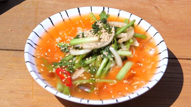Bowl of refreshing kimchi soup made with fresh young radish