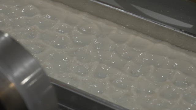 Liquid mixture in a metal container