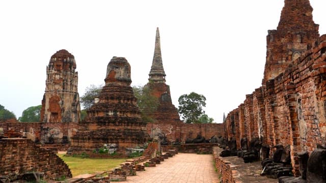Brick structures and statues of an old Buddhist temple, the historic site