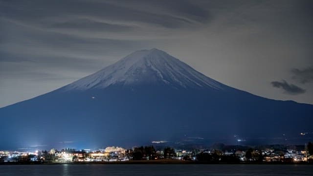 Night view of a Mount Fuji and city lights