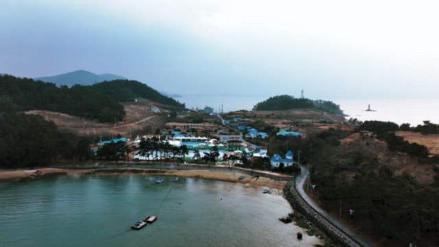 Coastal Village by Tranquil Waters at Dusk