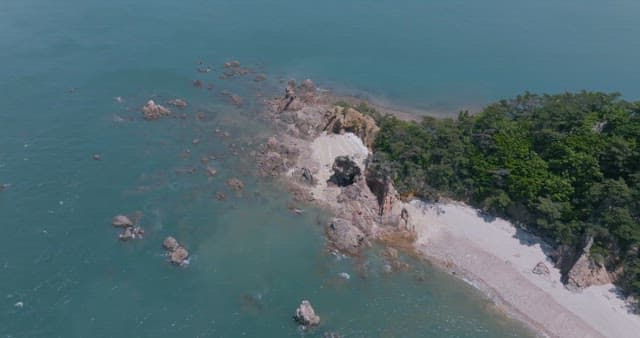 Serene Coastal Landscape with Rocky Shoreline