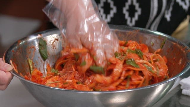 Fresh Korean Melons and Noodles Mixed with Red and Spicy Sauce