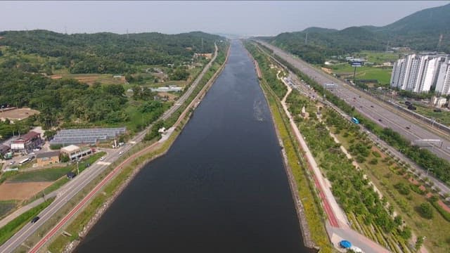 Large Canal Running Between Cities
