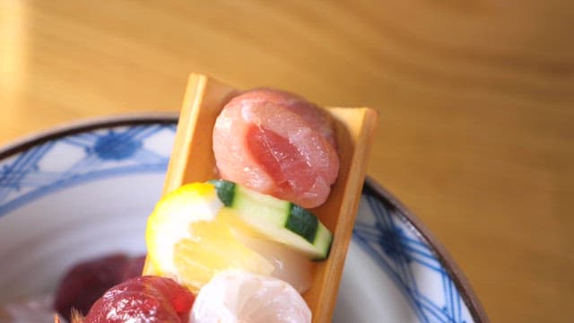 Raw fish rice bowl with colorful and fresh seafood