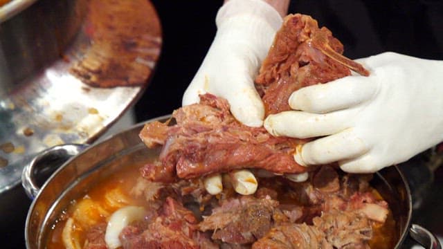 Pork backbone stew meat cut by hands