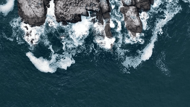 Coastal Cliffs with Waves Crashing
