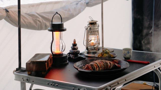 Cozy outdoor camping meal setup