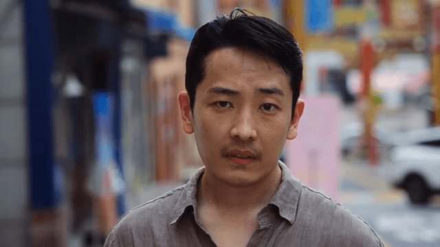 Man walking on a busy city street