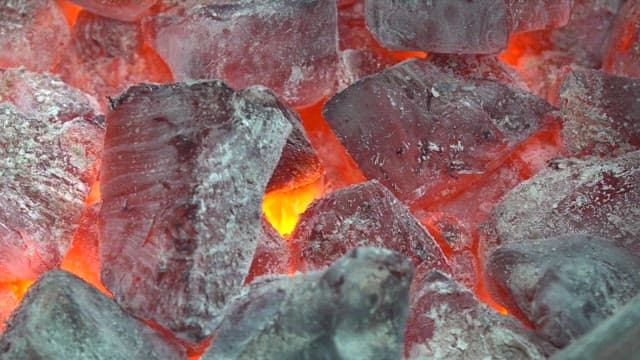 Charcoal turned red by fire