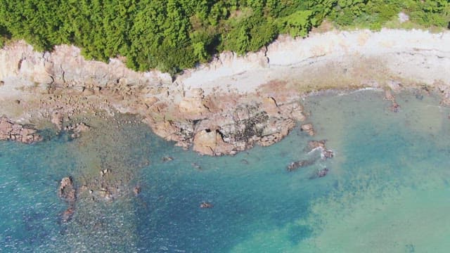 Rocky coastline with clear blue water