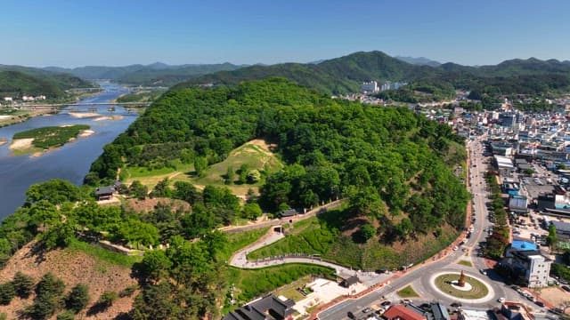 Lush green park with a traditional pavilion