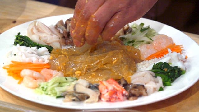 Plate of starch sheet salad with mustard sauce