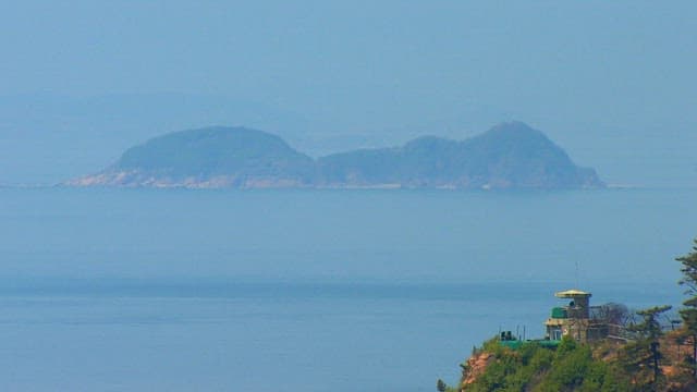 Coastal Watchtower Overlooking Distant Islands