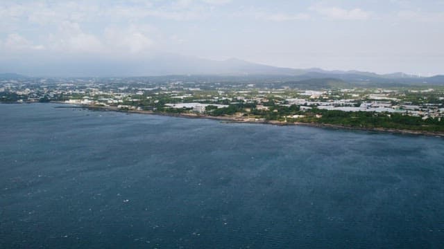 Sea and Coastal Cityscape on a Cloudy Day
