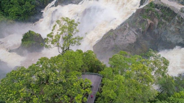 Barron Falls between rock cliffs and forests