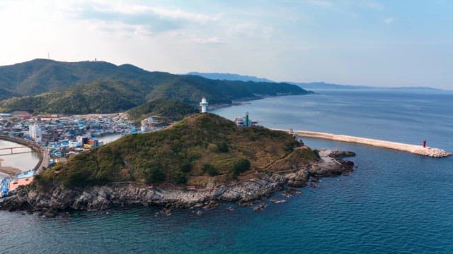 Coastal village with a lighthouse