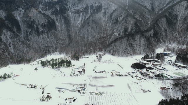 Snow-Covered Mountain Village in Winter