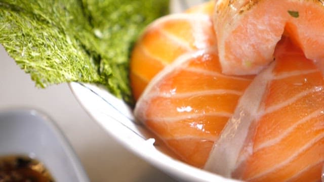 Delicious salmon rice bowl cooked with fresh ingredients